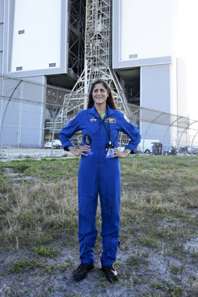 Sunita Williams poses in front of the Vehicle Assembly Building as NASA&#039;s first Space Launch System rocket and Orion spacecraft begin to roll toward Launch Complex 39B on March 17, 2022. The astronaut turns 60 on September 19. File Photo by Joe Marino/UPI