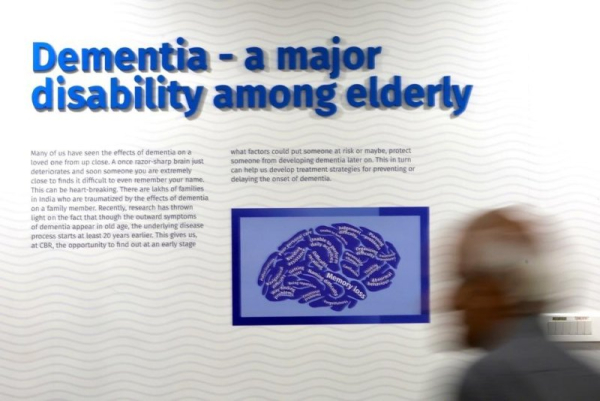 At an awareness seminar on World Alzheimer&#039;s Day in Bangalore, India, in 2024, a participant walks past. On Wednesday, University College London medical researchers announced what they say is the world&#039;s first successful treatment for Huntington&#039;s disease, which causes dementia. File Photo by Jagadeesh Nv/EPA